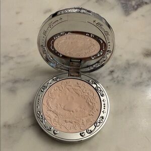 Elegant Silver Compact with Cream Blush
